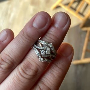 Low profile wedding band. Paid $5500. Bought from diamonds and designs in MN
